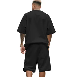 Premium heavy cotton men's oversized black t-shirt and sports shorts set back view