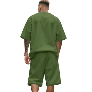 Back view of men's heavyweight terry olive green short sleeve and shorts set