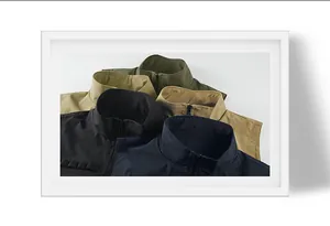 Detail view of men's lightweight outdoor vests showing various colors and collar styles