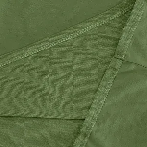 Close-up view of olive green heavy cotton terry fabric with precise stitching detail