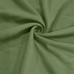 Macro detail showing the texture of heavyweight olive green French Terry cotton fabric