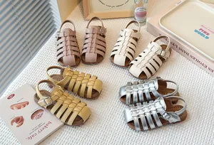 Cute children's woven closed-toe Roman sandals in pink, cream, yellow, and silver colors.