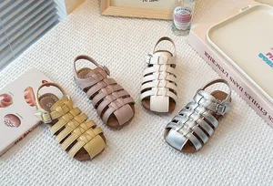 Children's hollow-out woven Roman sandals in four colors for summer beach wear