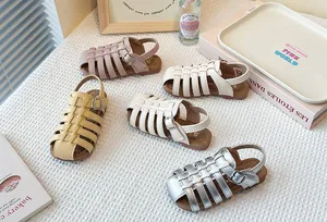 Various colors of children's woven hollow-out Roman sandals with soft soles