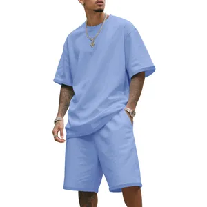 Close-up of men's light blue oversized hip-hop t-shirt and shorts sports set.