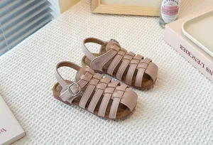 Classic children's woven hollow Roman sandals with soft sole for girls summer beach wear