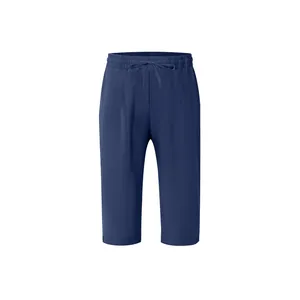 Close-up view of men's navy blue linen seven-point casual beach pants with drawstring