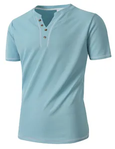 Detail view of light blue men's waffle knit Henley shirt with V-neck buttons.