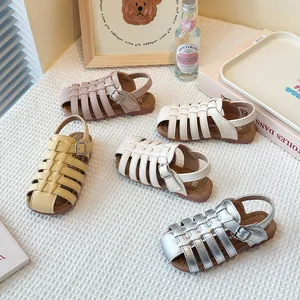 Children's hollow woven Roman sandals with soft soles for summer beach wear