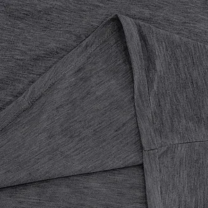 Macro view of heavy grey terry cloth fabric showing high-quality stitching details