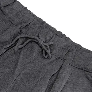 Detailed view of the drawstring elastic waistband on these grey heathered cotton shorts