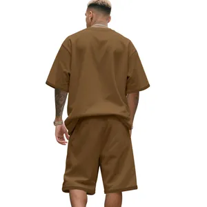 Back view of a men's loose brown heavyweight cotton T-shirt and shorts set.