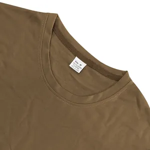 Detailed macro shot of brown heavyweight men's T-shirt neckline with size M white wash label