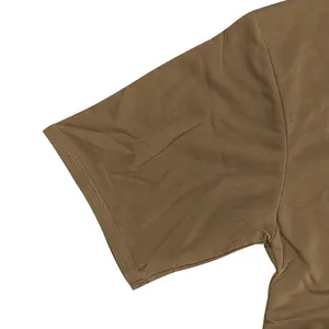 Close-up of brown heavy jersey cotton short sleeve showing detailed seam and fabric texture