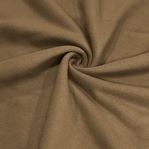 Macro view showing the soft and thick texture of heavyweight brown terry cotton fabric