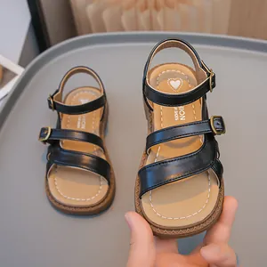 Elegant black girls' summer open-toe sandals featuring adjustable buckle straps and soft soles
