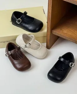 Vintage French style girls Mary Jane leather shoes displayed in black, beige and brown