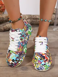 Close-up of vibrant graffiti print platform sneakers for women on a rustic deck