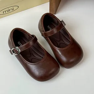 Vintage dark brown Mary Jane leather shoes for little girls featuring a retro pastoral style