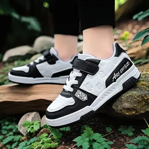 Classic black and white wear-resistant children's leather board shoes for boys and girls