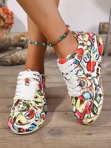 Close-up view of vibrant graffiti print sneakers with thick soles and white laces.