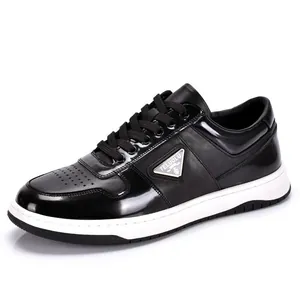 Men's black leather low-top sneakers with white sole and lace-up closure
