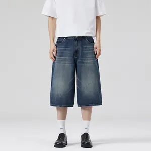 Men's loose straight-leg denim shorts in American street style, dark blue wash