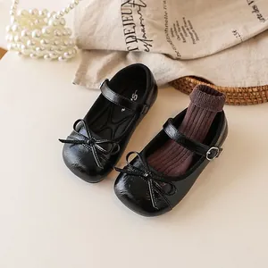 Elegant black Mary Jane princess shoes for girls with bow detail and buckle strap