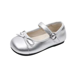 Silver metallic princess shoes for girls featuring a cute bow and adjustable buckle strap