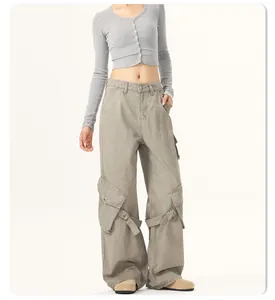 Vintage high-street wide-leg cargo pants with oversized side pockets and strap details