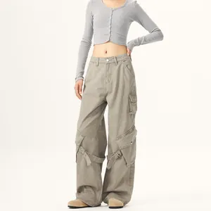 American vintage high street wide-leg cargo pants featuring large side pockets and straps
