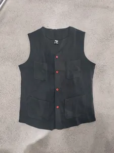 Front view of British style black V-neck men's vest with four distinct red buttons