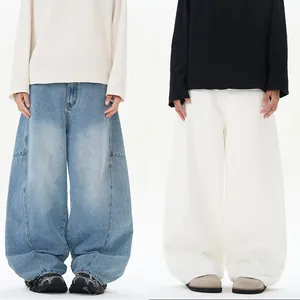 Jeans larghi a gamba curva in blu chiaro e bianco albicocca per uomo e donna