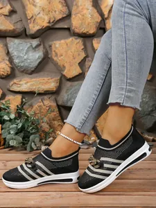Stylish breathable striped fly-knit sneakers with metal chain detail and comfy wedge heel