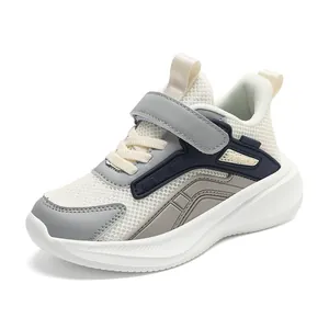 Breathable mesh children's sneakers in white and gray, stylish running shoes for kids