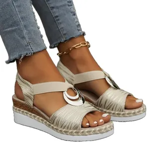 Elegant champagne wedge espadrilles with metallic rings and elastic straps for women