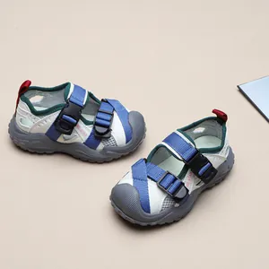 Durable children's closed-toe sports sandals featuring breathable mesh and blue straps