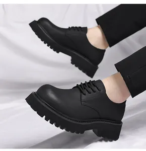 Detailed side view of men's chunky black platform Derby shoes on white fabric background