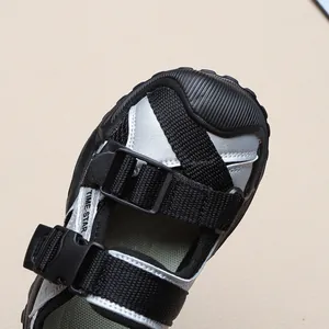 Close-up detail of boys closed-toe breathable sports sandals with durable buckle straps