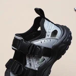 Detail view of boys' breathable mesh sports sandals with adjustable black straps