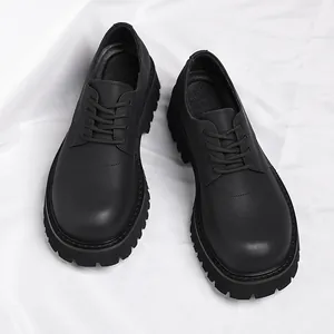 Stylish men's black chunky Derby shoes with thick platform soles in high street style.