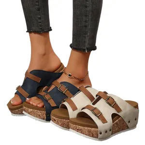 Women's open-toe wedge platform sandals with adjustable double buckles and cork sole.