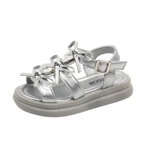 Elegant silver girls princess sandals featuring bow-knot and rhinestone details on thick sole