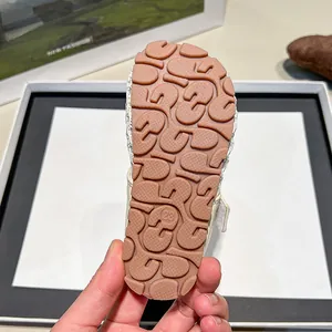 Detailed view of anti-slip rubber sole for children's breathable hollow mesh mules