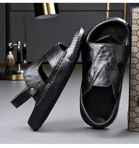 Detail view of premium black cowhide leather men's sandals with textured finish and thick sole