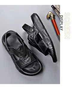 Detail view of men's black cowhide leather sandals with thick, breathable soles.