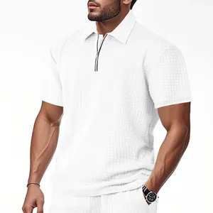 Detailed view of high-quality white jacquard fabric texture on men's zipper polo shirt