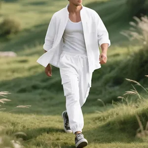 Detailed view of white linen stand collar shirt and matching cargo pants set for men