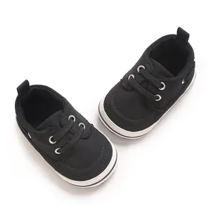 Detailed top-down view of black canvas baby walker shoes for infant boys and girls