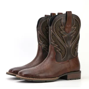 Vintage men's brown western cowboy boots with embroidery and mesh cutout details